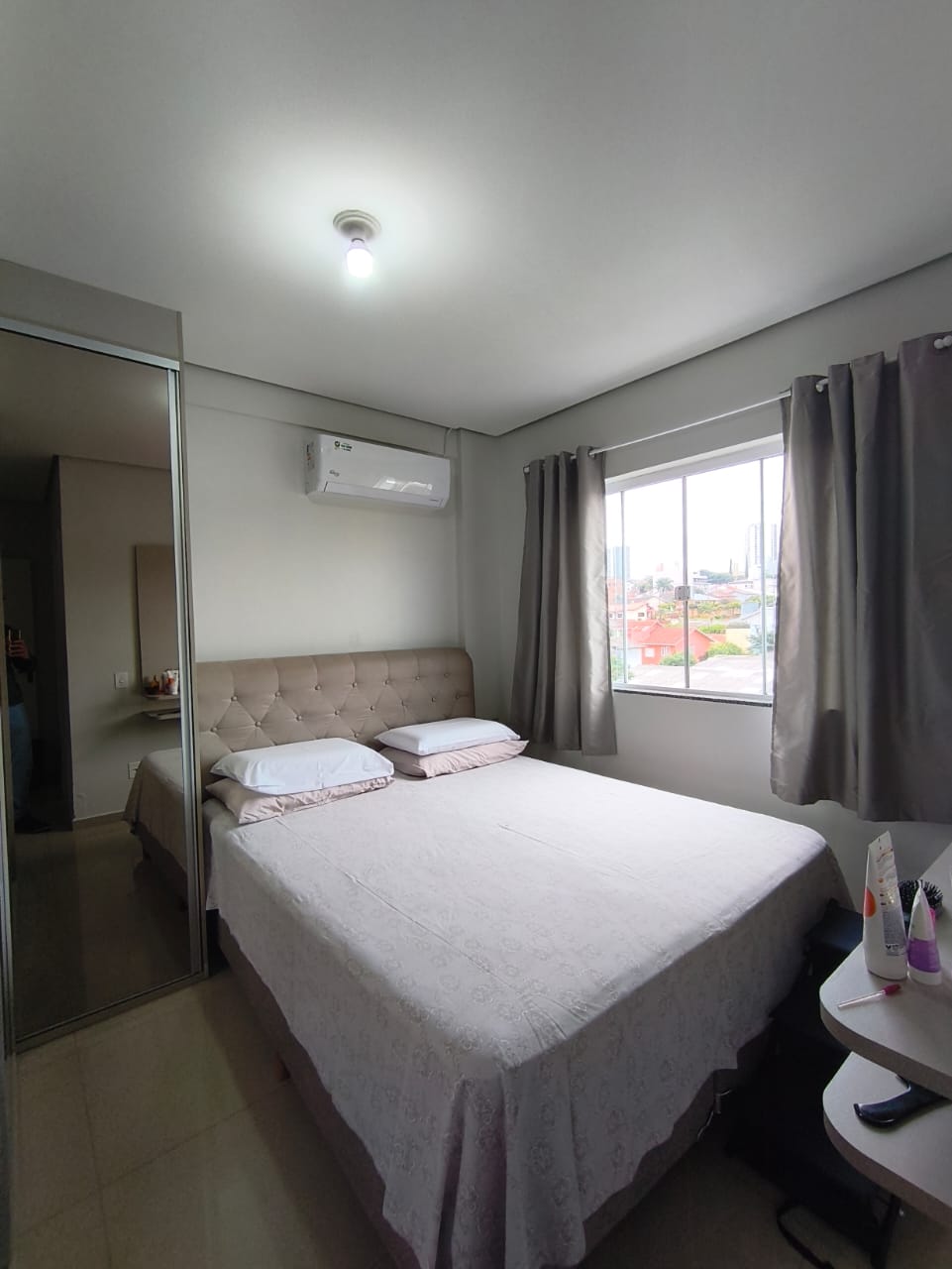 Quarto com ar-condicionado